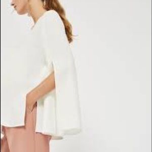 Off white v neck, split bell sleeve top